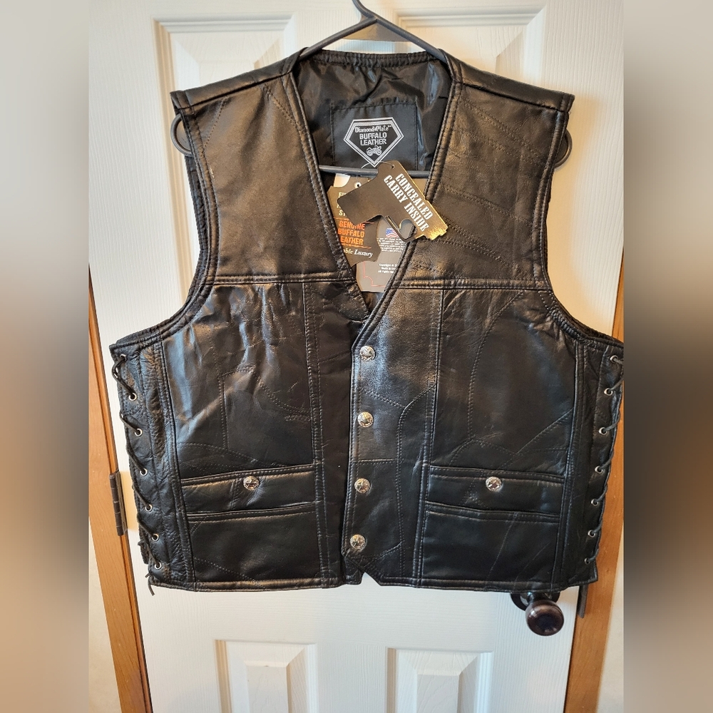 Diamond Plate leather biker vest decked out with concealed carry inside